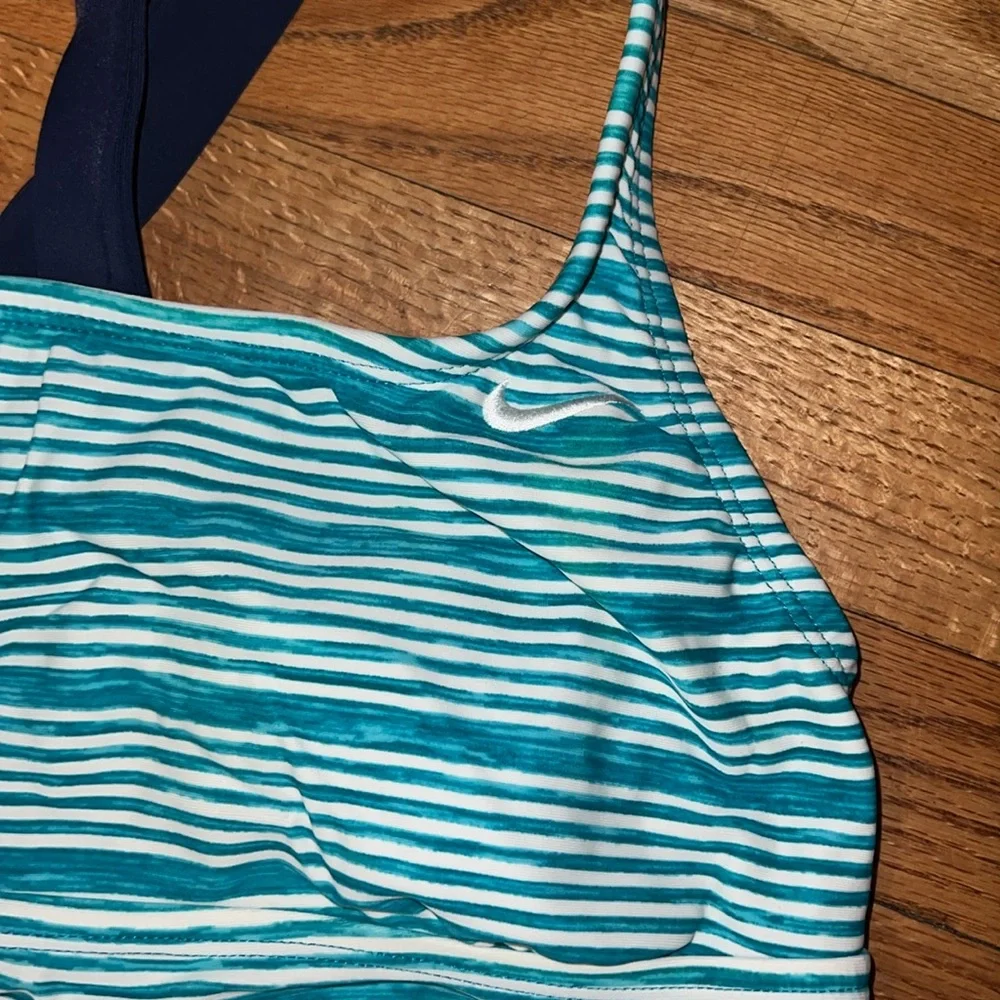 Women’s‎ Nike, green and white stripe swim top.  Medium